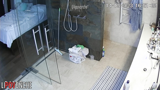 A sexy milf with big nipples is cleaning the bathroom completely naked