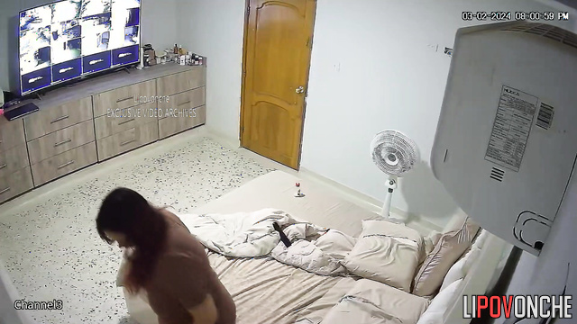 A chubby mommy selects porn movies from her collection to watch with her lover