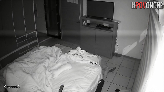 The sly wife crept up under the covers to her husband's erect dick