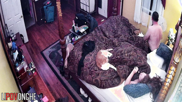 A naked redheaded wife gently gives her husband a back massage