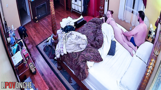 A pretty wife walks out of the bathroom in front of her husband with her pants down