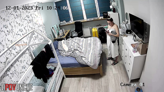 The bedroom camera captured a completely naked mommy with gorgeous, firm breasts