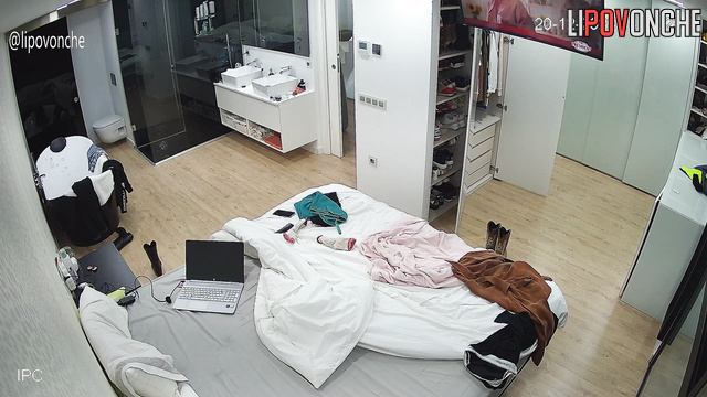 A hidden camera captured a sexy girl undressing completely before taking a shower