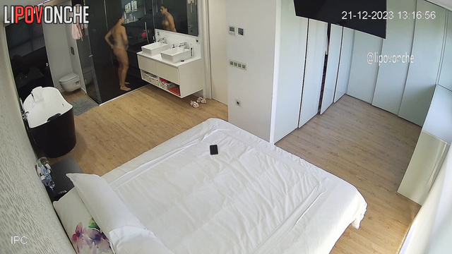 A cute housewife bares her voluptuous tits and sexy ass before taking a shower