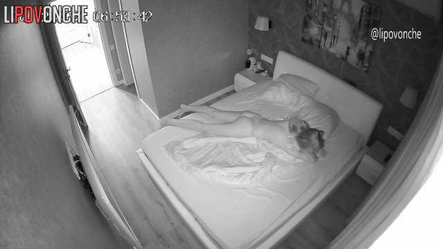 A sexy brunette wearing only panties just can't seem to wake up early in the morning