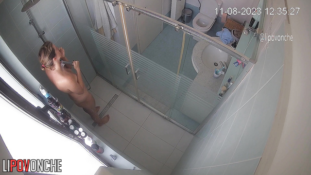 A tired mommy washes her sexy naked body under jets of water in the shower