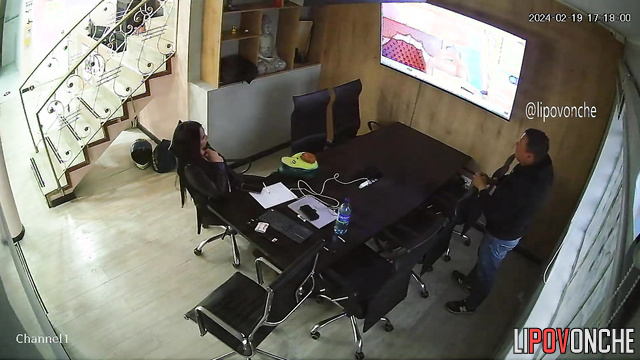 A busty actress is being interviewed for a job during a live porn broadcast on TV
