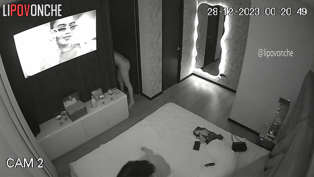 Two gorgeous lesbians are drinking wine in bed and having hot sex