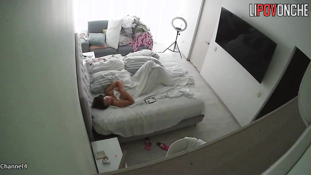 A seductive brunette with big boobs loves to sleep totally naked