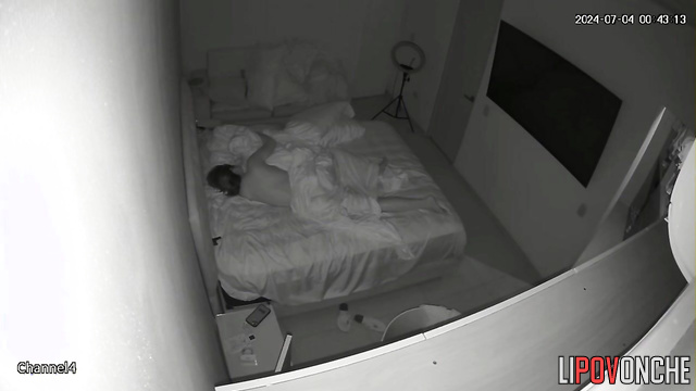 A sexy beauty with a seductive, firm ass sleeps completely naked
