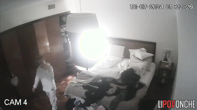 An excited blonde attaches a dildo to the pillow to get more pleasure