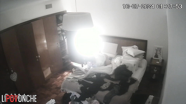 An excited blonde attaches a dildo to the pillow to get more pleasure