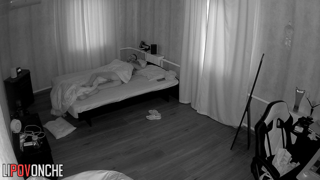 A skinny girl sleeping in bed showed her toned, naked butt to the camera