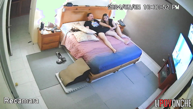 A pretty blonde took a break from watching TV to play with her husband's big cock