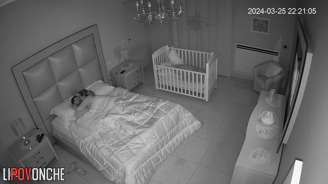 Late at night, sleepy wife manually brings her aroused husband to orgasm