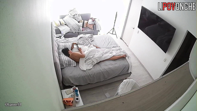 Her husband is spying on her with a hidden camera