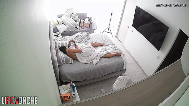 Her husband is spying on her with a hidden camera