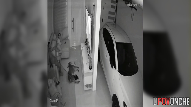 Couple watching tv together / and at this moment they are being watched