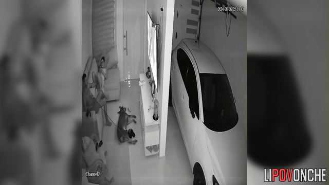 Couple watching tv together / and at this moment they are being watched