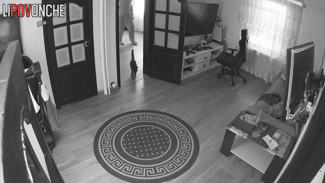 Guy's a little nervous, so he's walking around the apartment