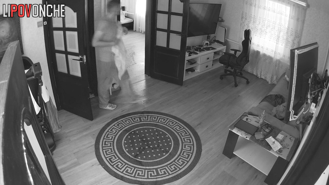 Guy's a little nervous, so he's walking around the apartment