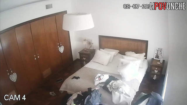 Beauty blonde walking around the room and being watched