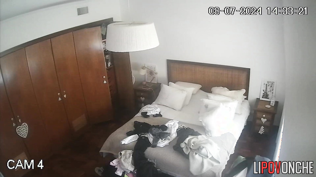 Beauty blonde walking around the room and being watched