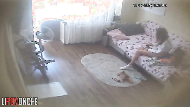 Young skinny brunette playing with her fluffy friends