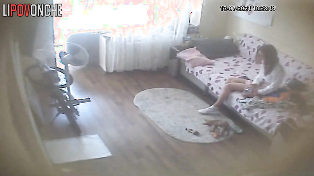 Young skinny brunette playing with her fluffy friends