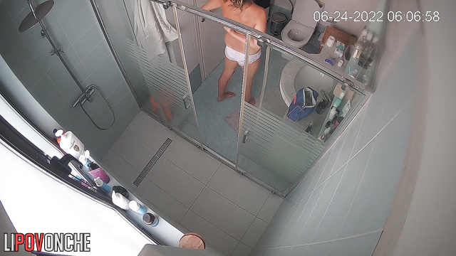 A pretty girl slowly pulls down white panties, revealing her inviting pussy