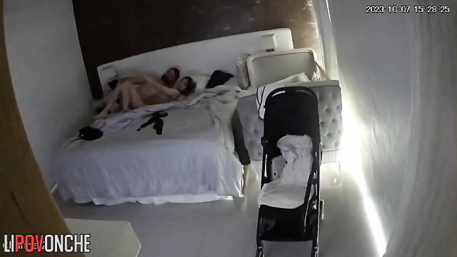 Parents try to enjoy a quiet night - bedroom scene