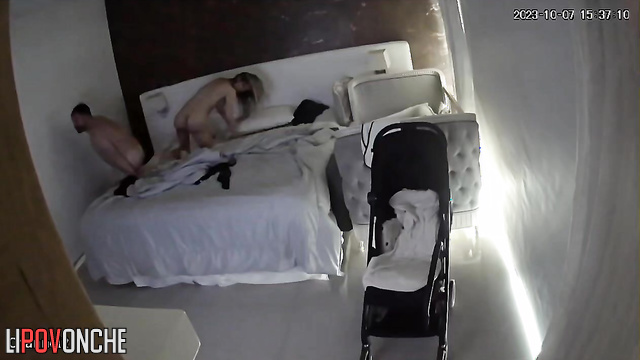 Parents try to enjoy a quiet night - bedroom scene