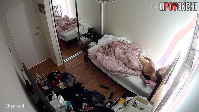Brunette was lying in bed and scratching her butt
