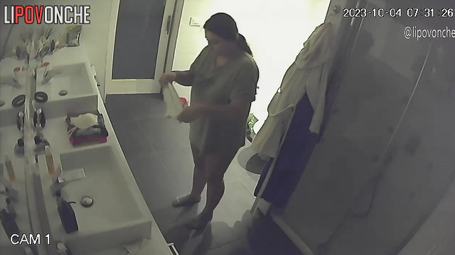 First chubby lady fed the cat and then started doing her routine