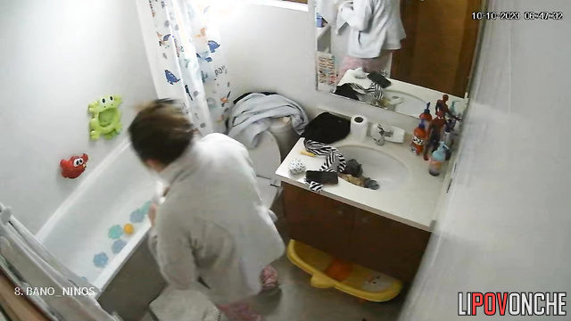 Her habit is to sit on the toilet and text, spy cam