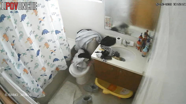 Her habit is to sit on the toilet and text, spy cam