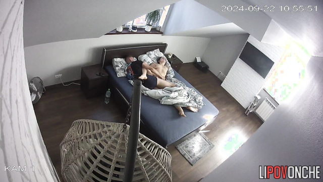 Man fucked a brunette on the bed in missionary position