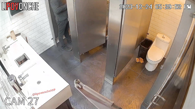 Three people secluded themselves in a toilet stall