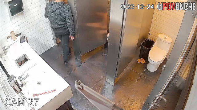 Three people secluded themselves in a toilet stall