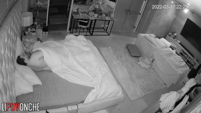 Blonde MILF touches her partner's small cock while sleeping in bed