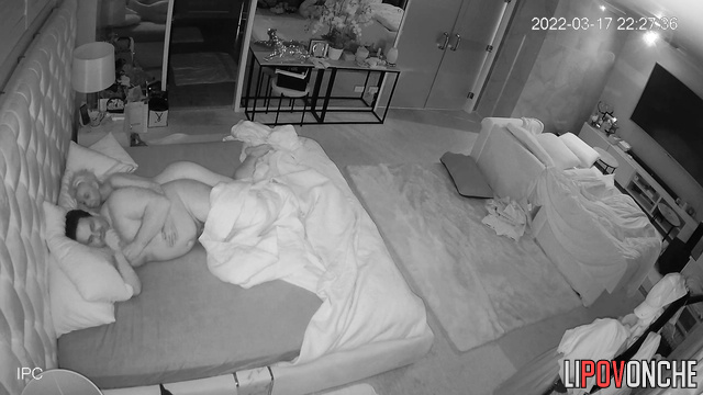 Blonde MILF touches her partner's small cock while sleeping in bed