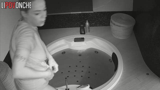 Busty blonde relaxes in hot jacuzzi and thinks about having sex later
