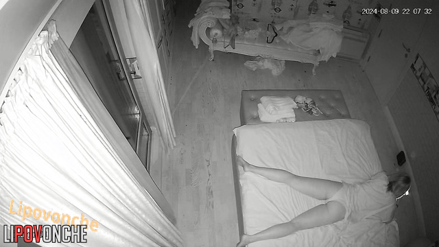 Sexy blonde relaxes and browses on her phone after a long day at work