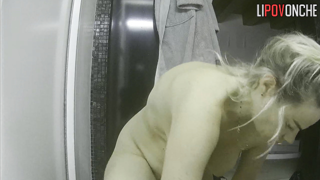Blonde preparing for work with a stone face (solo)
