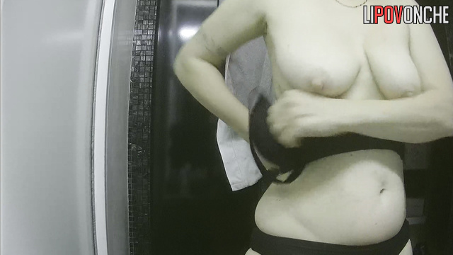 Blonde preparing for work with a stone face (solo)