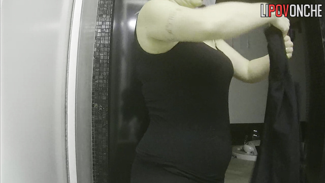 Blonde preparing for work with a stone face (solo)