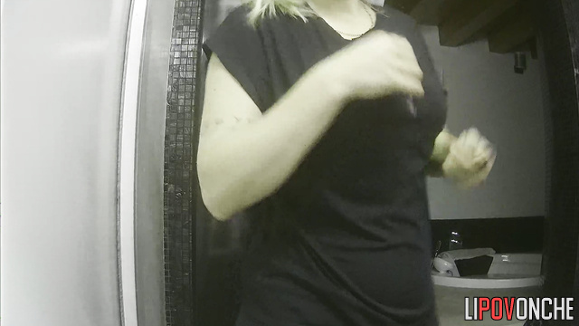 Blonde preparing for work with a stone face (solo)