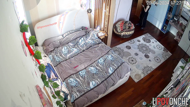 Young boyfriend and girlfriend relaxing in the bedroom