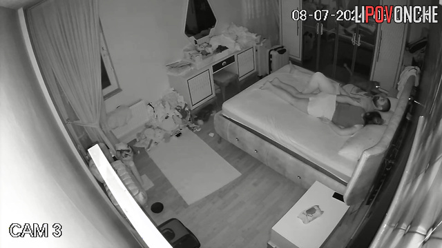 A husband warms up his wife's vagina to insert his long cock into it