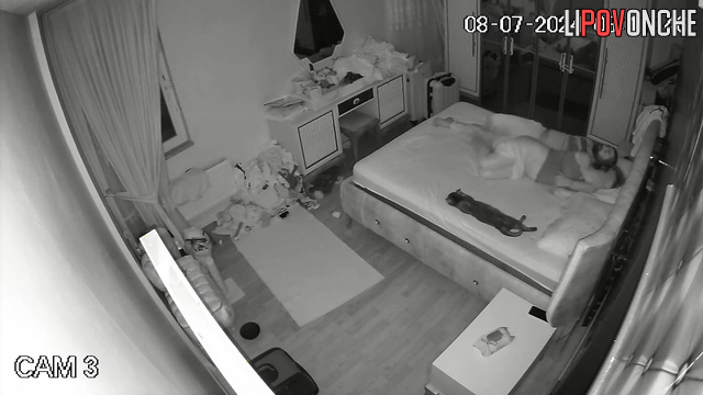 A husband warms up his wife's vagina to insert his long cock into it